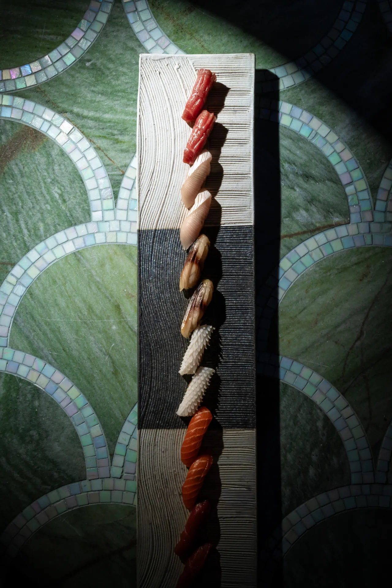 Artfully plated sushi at Aki London, showcasing premium Japanese craftsmanship of our sushi in Marylebone