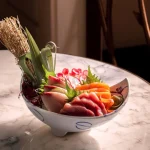 Sashimi platter at Aki London featuring Portuguese blue fin tuna akami, chu toro, otoro, with 30‑year‑aged soy sauce and fresh root wasabi.