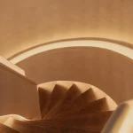 Backlit spiral staircase leading to The Atrium private event space at Aki London, Marylebone — an exclusive entrance for terrace hire and private dining