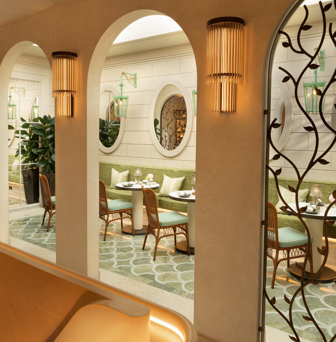 Al fresco dining at The Atrium, Aki London’s private terrace in Marylebone, with a retractable glass roof and elegant table setting
